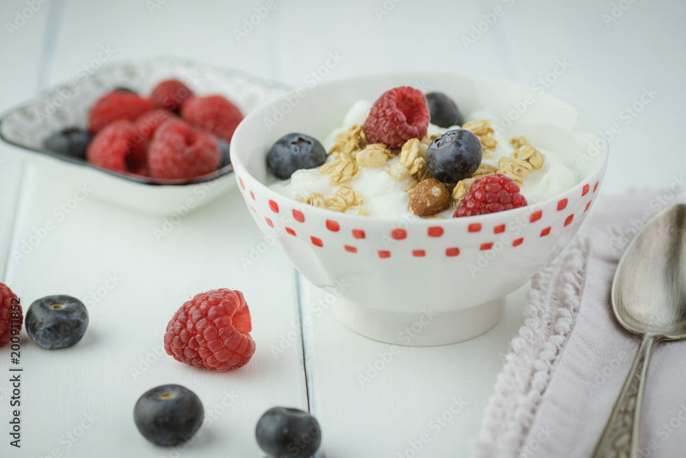 Healthy breakfast with berries, granola, yogurt parfait. Healthy breakfast with berries, granola, yogurt parfait.