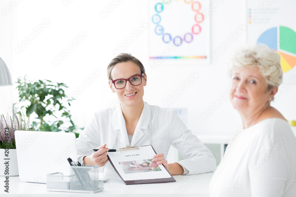 Dietician doctor looking at camera Dietician doctor looking at camera