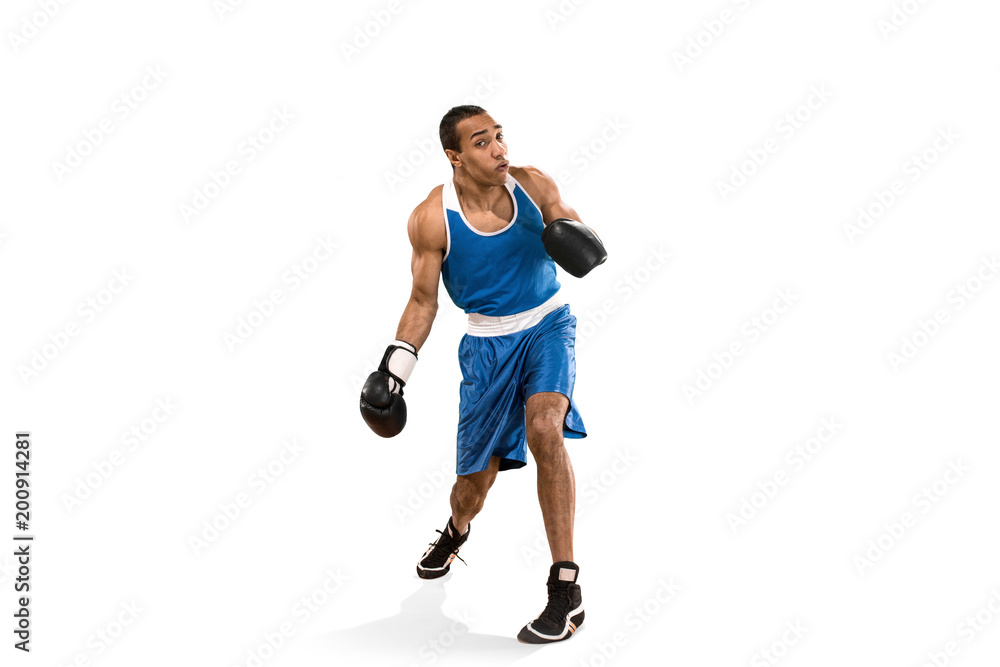 Sporty man during boxing exercise. Photo of boxer on white background