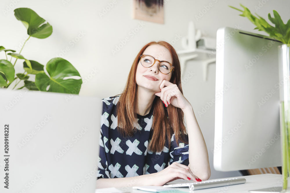 Cute young girl working on eyeglasses creating new project. Modern model of business woman. Cute young girl working on eyeglasses creating new project. Modern model of business woman.