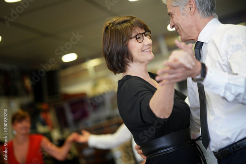 Senior couple taking dance lessons