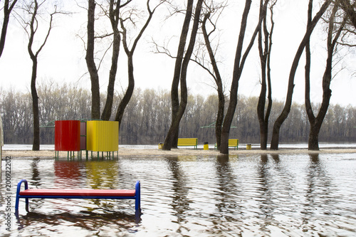 The river spilled from its banks. Water flooded. photo