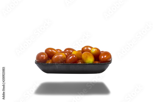 Fototapeta Naklejka Na Ścianę i Meble -  Small tomatoes on white background.