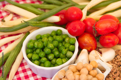 variety of kitchen ingredients with fresh and dried legumes