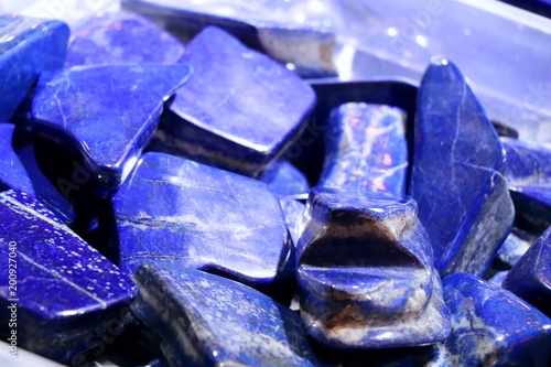 Cobalt blue lapis lazuli stones. Selected focus. Minerals exhibition.