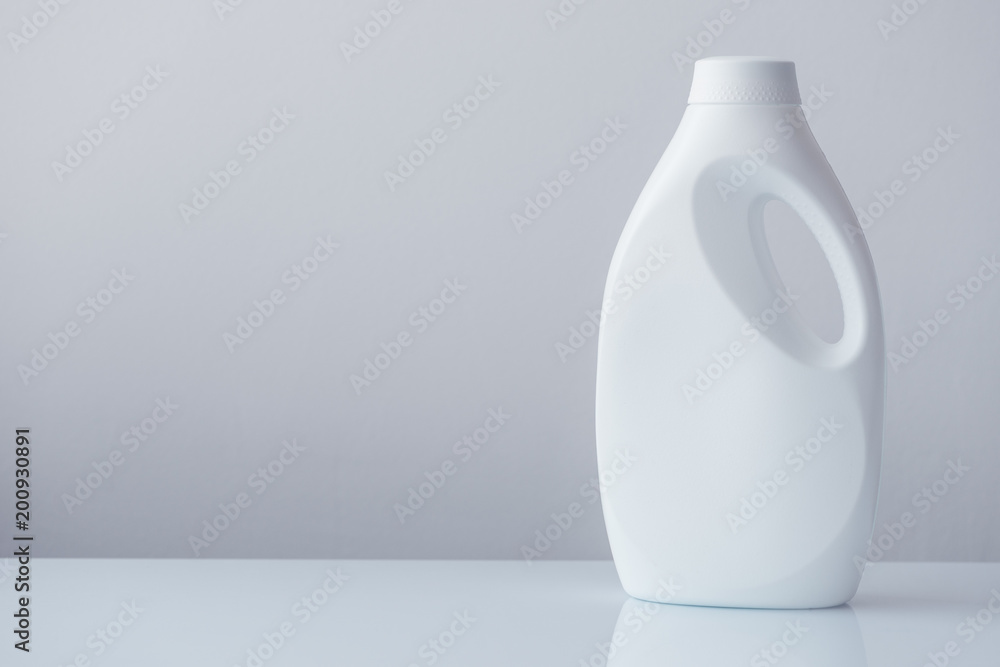 White plastic bottle container for liquid detergent