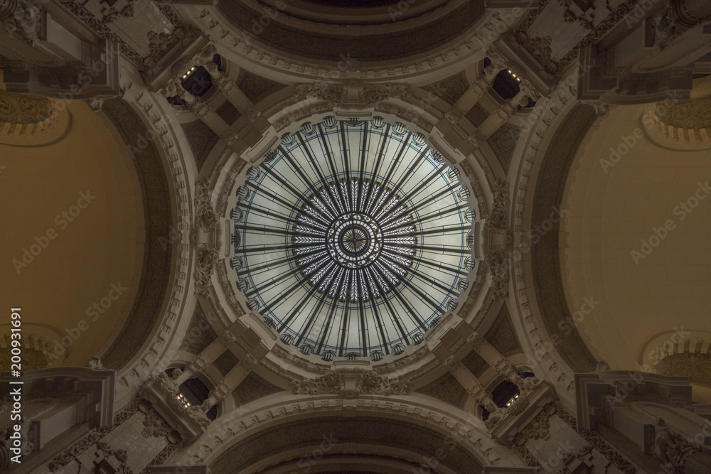 Cupola. White glass dome. stained glass cupola. Interior decoration in early 20th century building is rich in iron and details in perfect symmetry