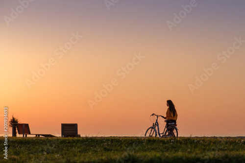 A girl with bike