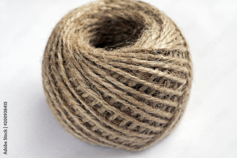 the texture of the twine strands in a tangle on a white background the texture of the twine strands in a tangle on a white background