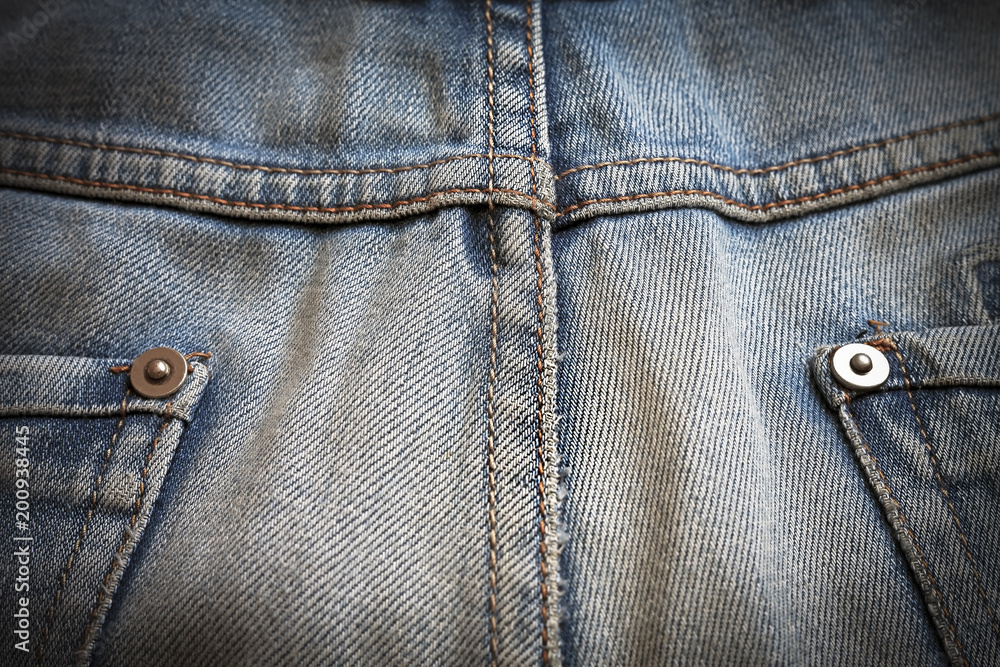 macro texture shabby blue denim with yellow stitched thread macro texture shabby blue denim with yellow stitched thread