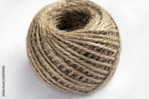 the texture of the twine strands in a tangle on a white background