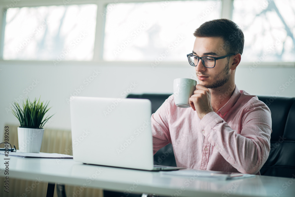 Young man in office
