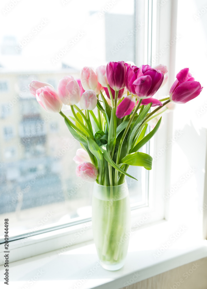 A bouquet of tulips in a vase. Soft selective focus A bouquet of tulips in a vase. Soft selective focus
