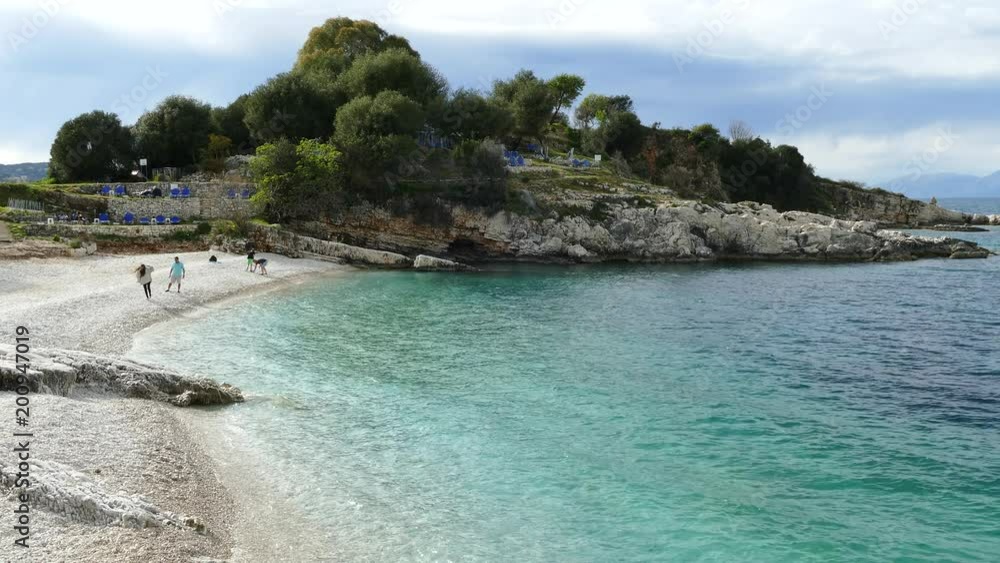 Blue lagoon beach coast, Kassiopi village, Corfu Island, Greece. Bataria beach with clear turquoise water. Blue lagoon beach coast, Kassiopi village, Corfu Island, Greece. Bataria beach with clear turquoise water.