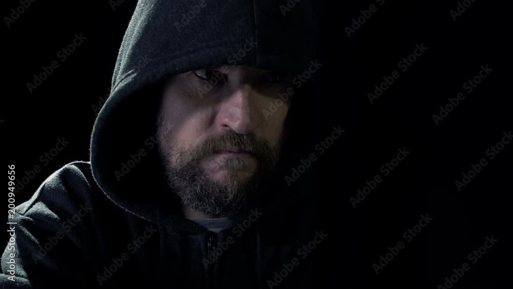 Hacker at work in the dark typing keyboard slow motion closeup Hacker at work in the dark typing keyboard slow motion closeup
