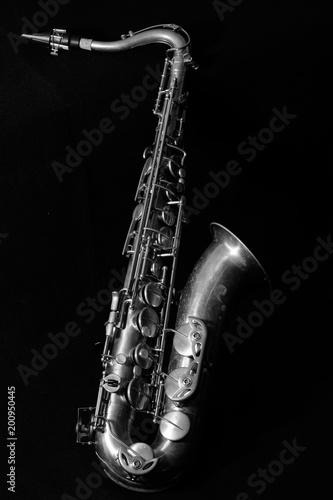 Black and white of tenor sax on black background