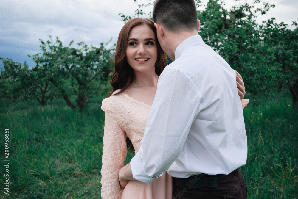 Nice outdoor wedding photography of young beutiful couple in summer park Nice outdoor wedding photography of young beutiful couple in summer park