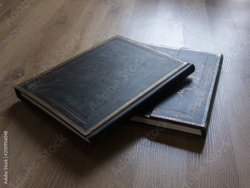 Ancient books on wooden floor