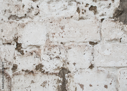 White and gray pink old brick wall with cracks background