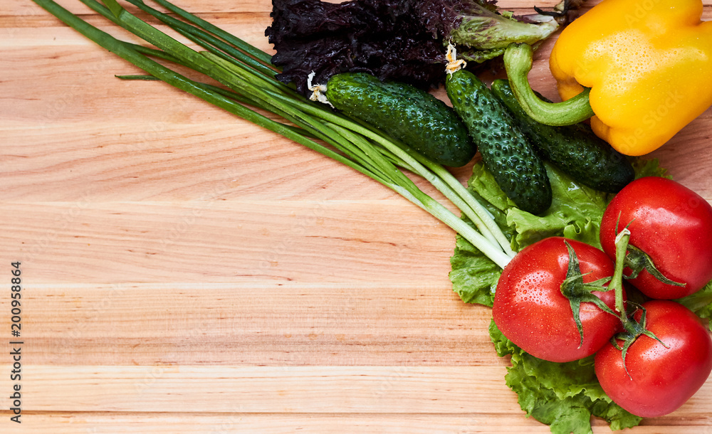 Fresh vegetables variety on the wooden table. Food layout. Copy space Fresh vegetables variety on the wooden table. Food layout. Copy space
