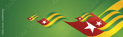 Togo Independence Day waving flags two fold green landscape background