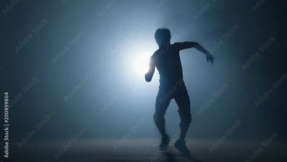Nacked strong man is trying freeze on one hand. experienced athlet. Nacked strong man is trying freeze on one hand. experienced athlet.