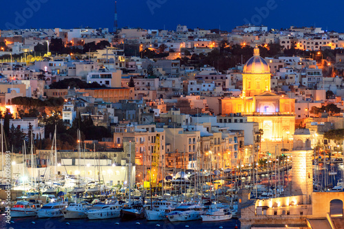 Valletta  Malta. View of Valletta and yachts marina from Upper Barrakka Gardens in the evening