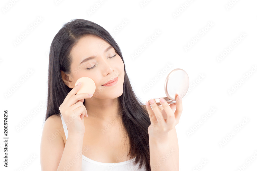 Portrait of beautiful asian woman applying powder puff at cheek makeup of cosmetic, beauty of girl with face smile isolated on white background, wellness and healthcare concept. Portrait of beautiful asian woman applying powder puff at cheek makeup of cosmetic, beauty of girl with face smile isolated on white background, wellness and healthcare concept.