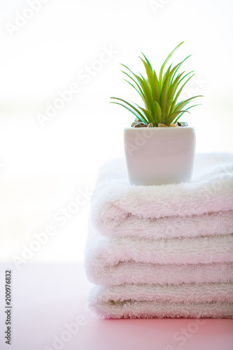 Spa Relax And Bath Concept, Stack Clean Bath Towels Colorful Cotton Terry Textile In Bathroom Pink Background, Copy Space