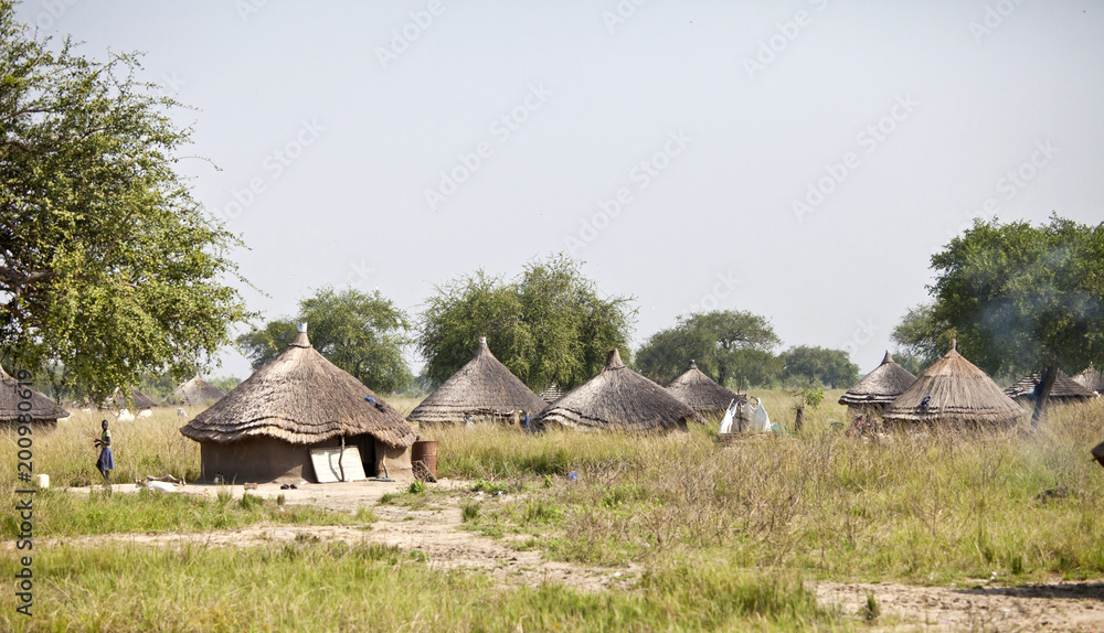 Village of grass huts in remote area of South Sudan. Village of grass huts in remote area of South Sudan.