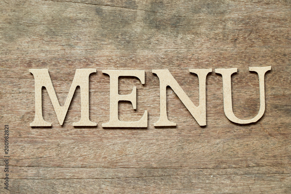 English alphabet in word menu on wood background English alphabet in word menu on wood background