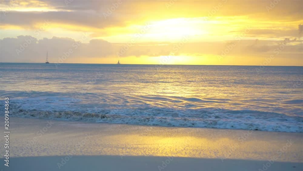 Amazing beautiful sunset on an exotic caribbean beach. Amazing beautiful sunset on an exotic caribbean beach.
