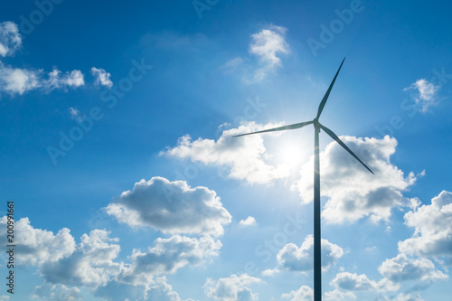 Wind generators turbines with blue sky background © phollapat