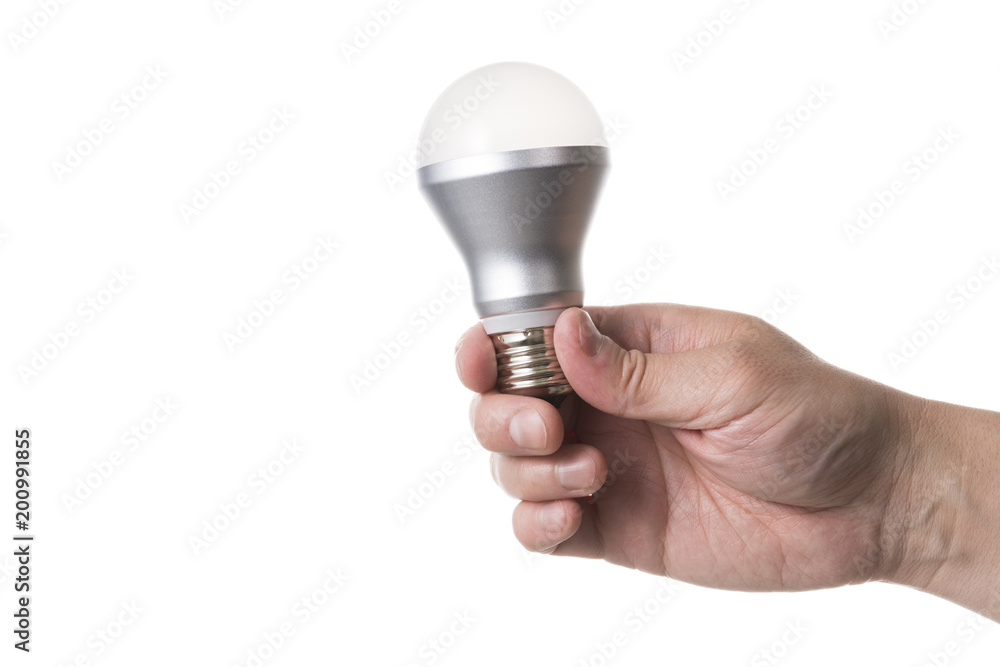 LED電球を持った手 LED電球を持った手