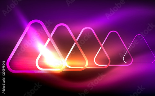Glowing vector triangle geometric shapes in dark space