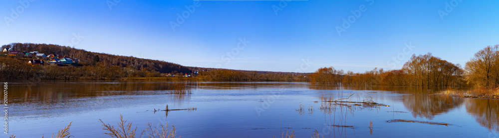Beautiful spring landscape with a spilled river Beautiful spring landscape with a spilled river