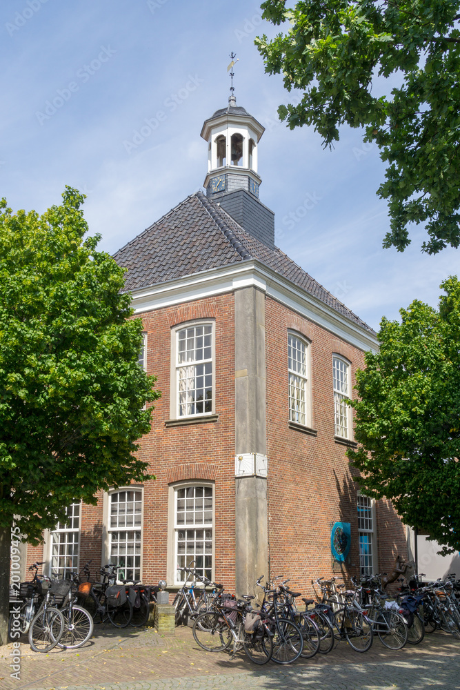 Building with tower at the 'Kerkplein' (Church Square) in the city of Ootmarsum, NLD