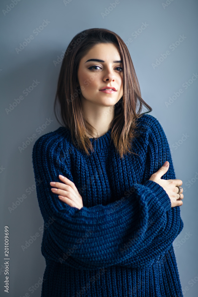 Portrait of young sensual woman with crossed arms Portrait of young sensual woman with crossed arms