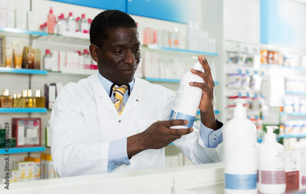 African American pharmacist working