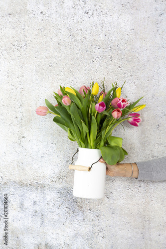 Fototapeta Naklejka Na Ścianę i Meble -  white Flower vase with colorful tulips