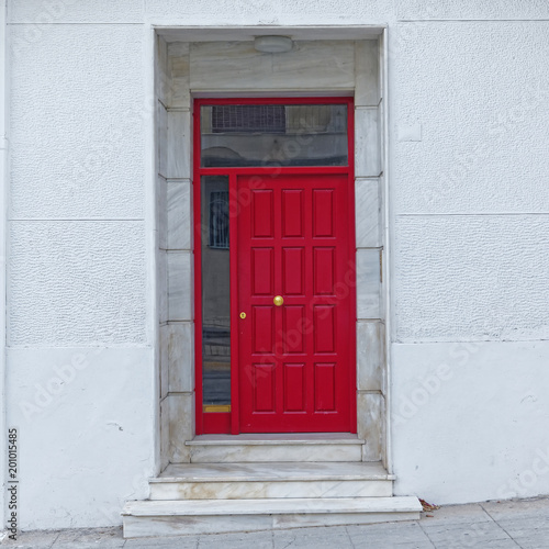 red door on white wall  elegant house entrance