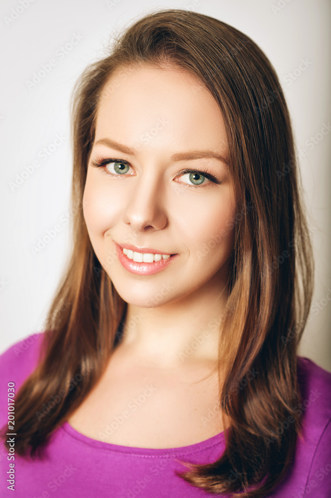 Young beautiful woman studio shot, pretty girl with professional make up