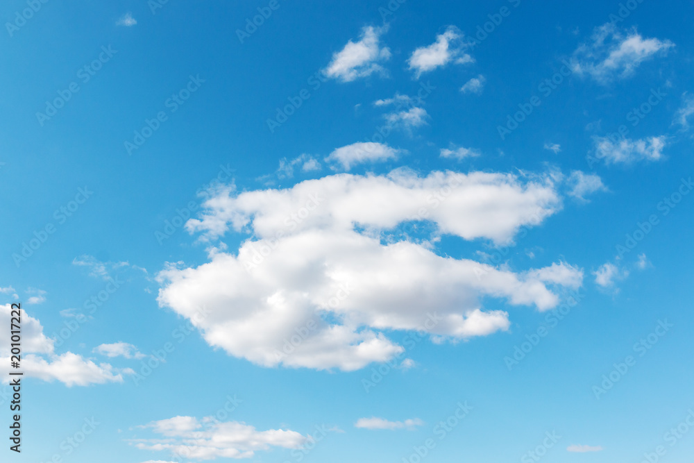 beautiful fluffy clouds against a blue sky beautiful fluffy clouds against a blue sky