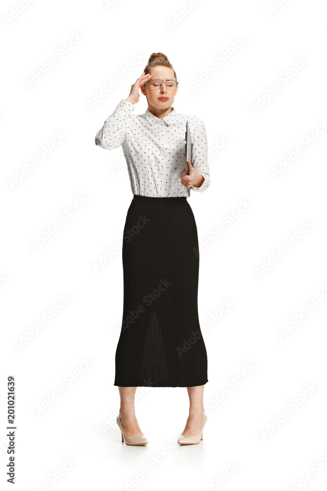 Full length portrait of a surprised female teacher holding a folder isolated against white background Full length portrait of a surprised female teacher holding a folder isolated against white background