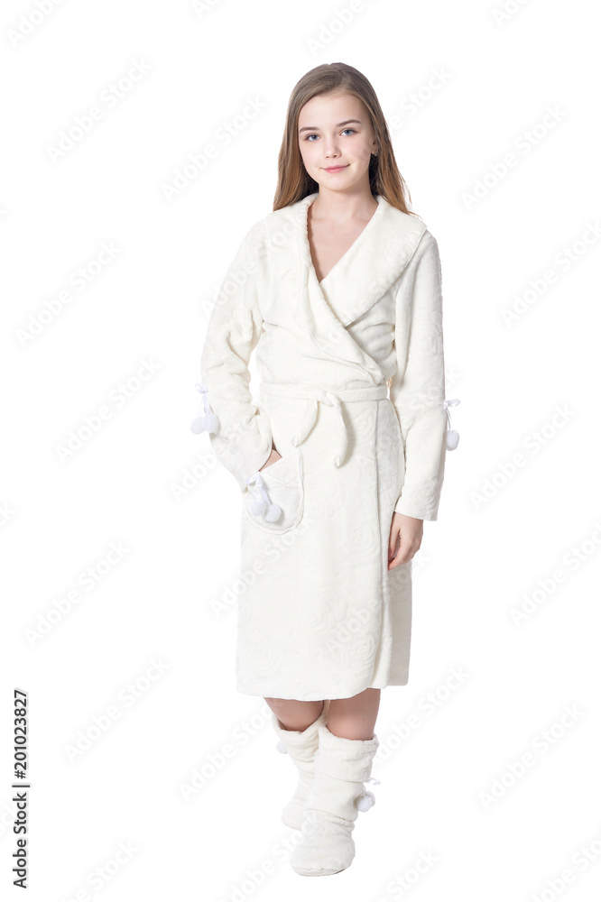 Happy little girl in white bathrobe posing isolated Happy little girl in white bathrobe posing isolated