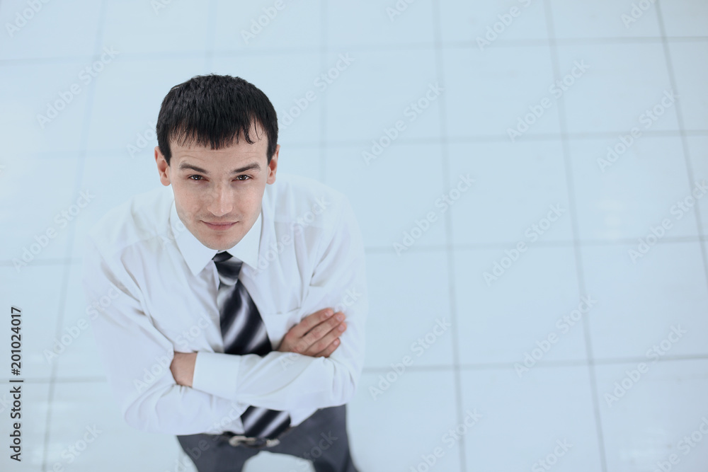 view from the top: portrait of smiling businessman view from the top: portrait of smiling businessman