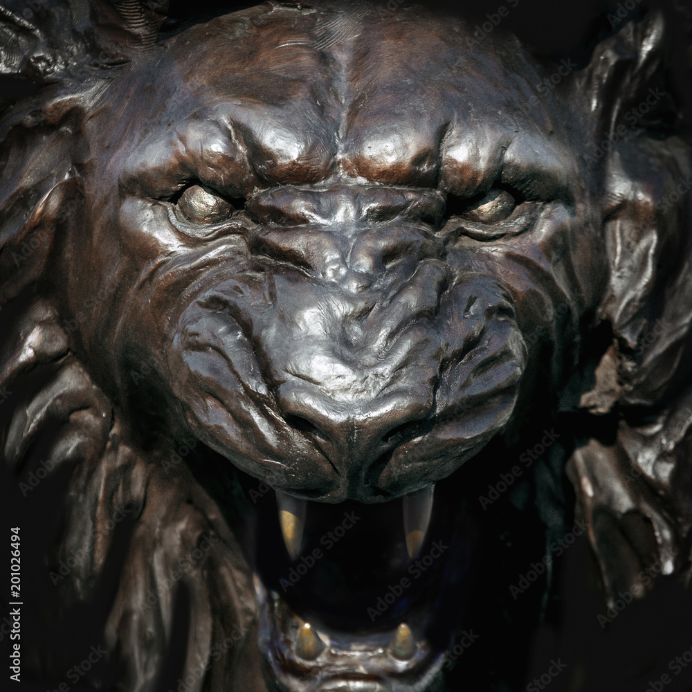 Lion grin face, statue