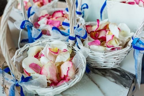 Closeup : many color rose petals in basket prepare for use in wedding ceremony, select focus