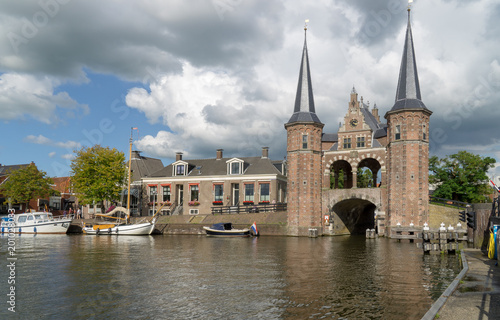 Waterpoort (Water gate) seen from the Lemmerweg in the city of Sneek in the province Friesland, The Netherlands