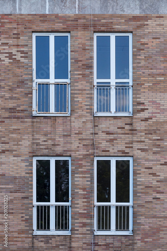 Windows on a red brick house